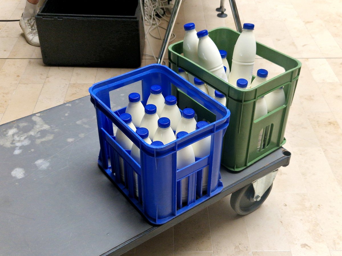 Crates of fresh milk bottles ready at the dairy